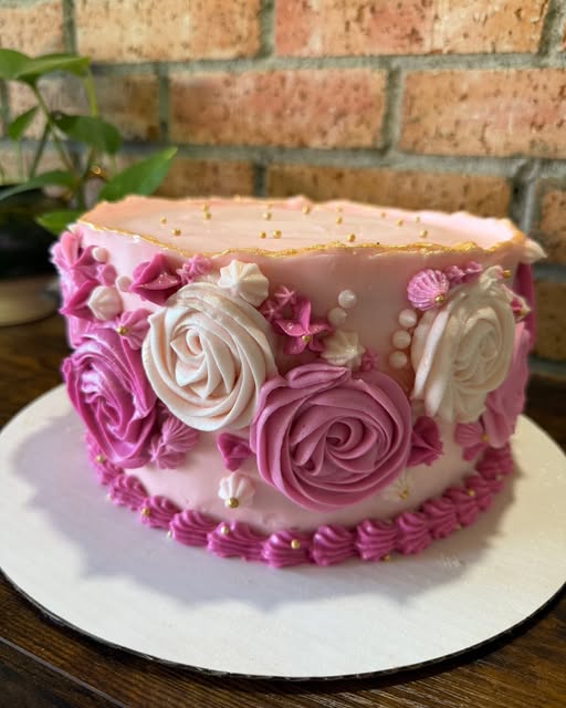 Velvet Wing blush cake with hand-piped buttercream florals and gold details