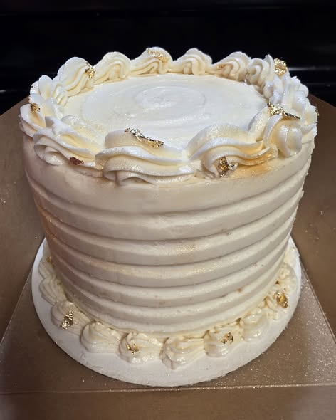 Velvet Wing off-white almond celebration cake with delicate gold details, view 2 of 2