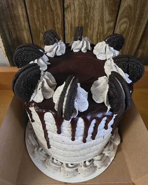 Velvet Wing Cookies & Cream celebration cake with chocolate drip and Oreo finish